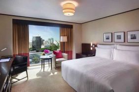 King bedroom with desk at the Conrad Bangkok.