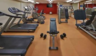 Fitness center with treadmills and machines at the Hilton Zurich Airport.