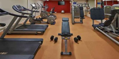 Fitness center with treadmills and machines at the Hilton Zurich Airport.