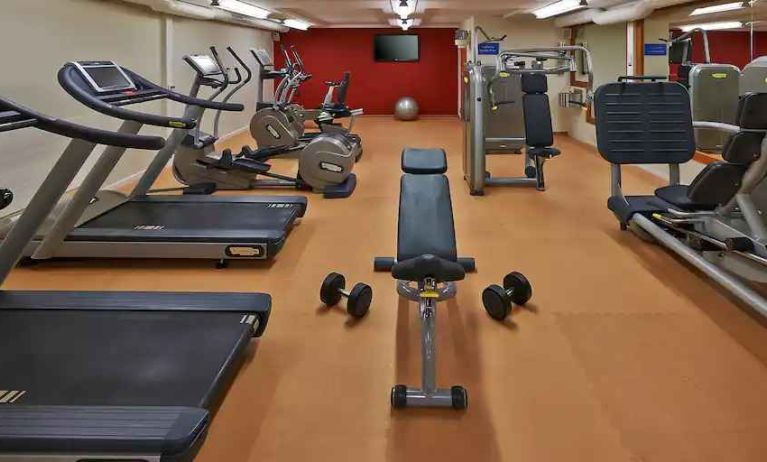 Fitness center with treadmills and machines at the Hilton Zurich Airport.