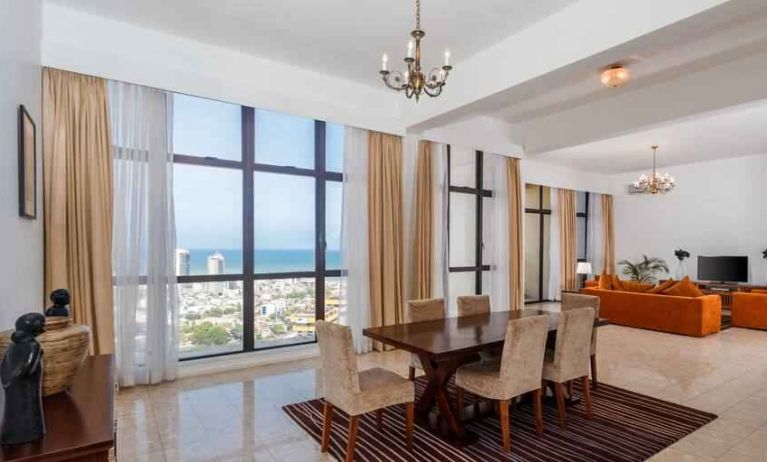 Living room with sofas, tables and chairs at the Hilton Colombo Residence.