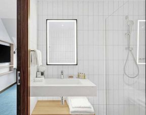 clean and spacious king bathroom with shower at Hilton Garden Inn Riga Old Town.