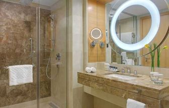 clean and spacious king bathroom with shower at DoubleTree by Hilton Riyadh - Al Muroj Business Gate.