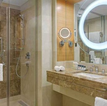 clean and spacious king bathroom with shower at DoubleTree by Hilton Riyadh - Al Muroj Business Gate.