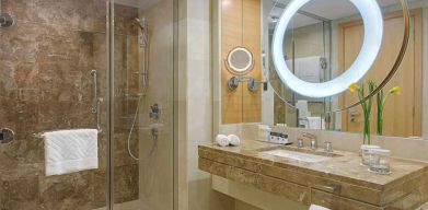 clean and spacious king bathroom with shower at DoubleTree by Hilton Riyadh - Al Muroj Business Gate.