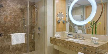 clean and spacious king bathroom with shower at DoubleTree by Hilton Riyadh - Al Muroj Business Gate.