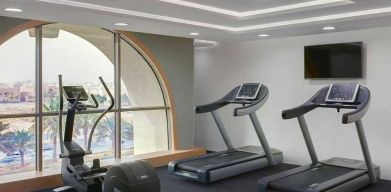 well equipped fitness center at DoubleTree by Hilton Riyadh - Al Muroj Business Gate.