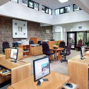 dedicated business center and workspace with PCs, internet, printers, and business desks at Hilton Addis Ababa.