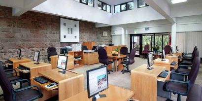 dedicated business center and workspace with PCs, internet, printers, and business desks at Hilton Addis Ababa.