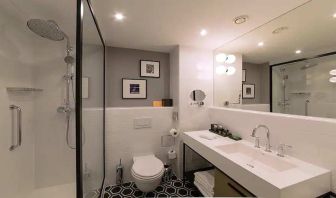 clean and spacious bathroom with shower at Canopy by Hilton Zagreb City Centre.