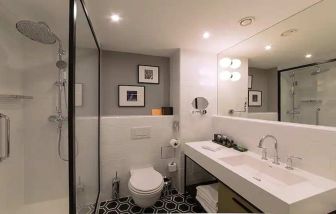 clean and spacious bathroom with shower at Canopy by Hilton Zagreb City Centre.