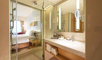 clean and spacious bathroom with shower at DoubleTree by Hilton Hotel Johor Bahru.