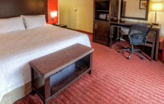 standard king bed with work desk at Hampton Inn & Suites Lebanon.