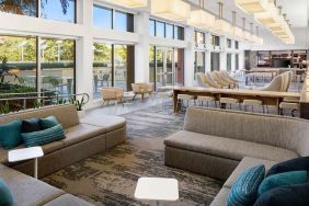 Spacious and comfortable lobby workspace at the Element Miami International Airport.