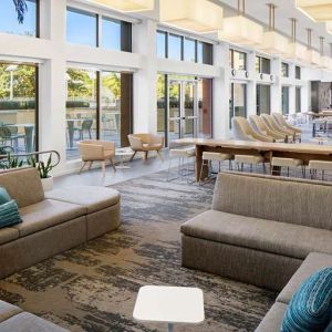 Spacious and comfortable lobby workspace at the Element Miami International Airport.