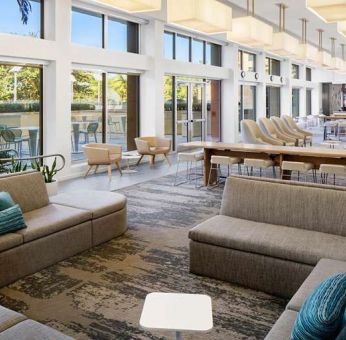 Spacious and comfortable lobby workspace at the Element Miami International Airport.