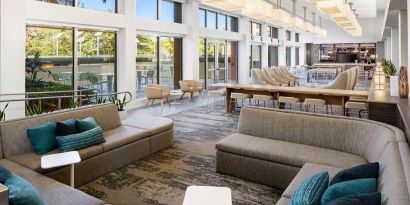 Spacious and comfortable lobby workspace at the Element Miami International Airport.