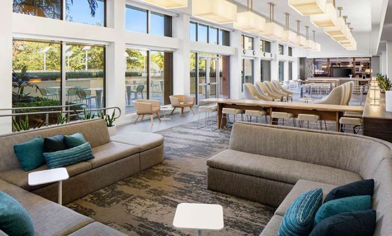 Spacious and comfortable lobby workspace at the Element Miami International Airport.