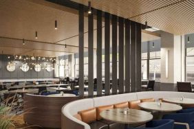 Restaurant area perfect as workspace at The Slate Denver, Tapestry Collection by Hilton.