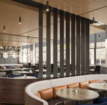 Restaurant area perfect as workspace at The Slate Denver, Tapestry Collection by Hilton.