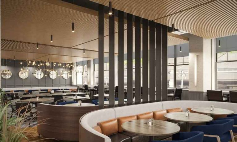 Restaurant area perfect as workspace at The Slate Denver, Tapestry Collection by Hilton.