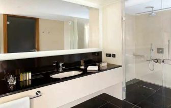 clean and spacious king bathroom with shower at DoubleTree by Hilton Zagreb.