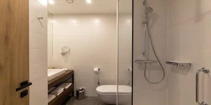 clean and spacious king bathroom with shower at Hilton Garden Inn Zagreb - Radnicka.