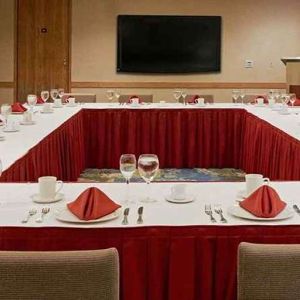 Conference room with square table at Miami International Airport Hotel.