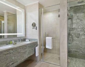 clean and spacious king bathroom with shower at Hilton Hurghada Plaza.