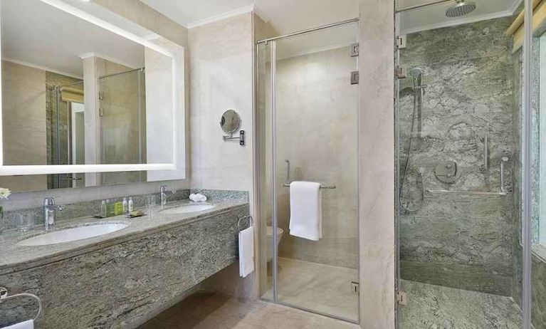 clean and spacious king bathroom with shower at Hilton Hurghada Plaza.