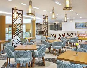 spacious lobby and coworking space at Hilton Hurghada Plaza.