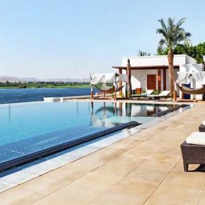 stunning outdoor pool with sunbeds at Hilton Luxor Resort & Spa.