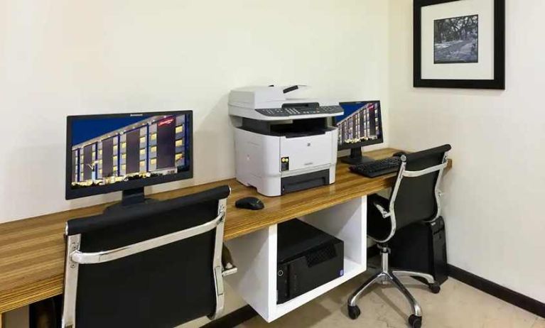 dedicated business center with PC, internet, printers, and work stations at Hampton by Hilton Vadodara-Alkapuri.