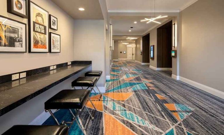 spacious connectivity center ideal for digital nomads at Embassy Suites by Hilton San Rafael Marin County.