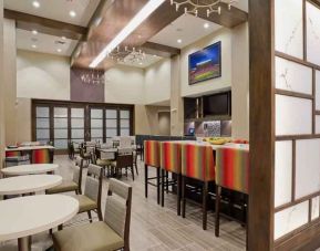 Dining area perfect for co-working at Hampton Inn & Suites Lubbock University.