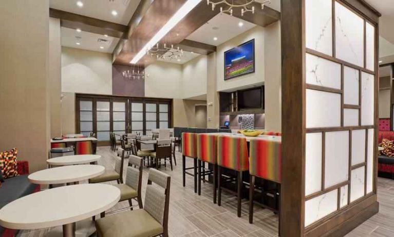 Dining area perfect for co-working at Hampton Inn & Suites Lubbock University.