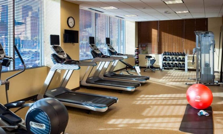 Fitness center with treadmills at the Hilton Garden Inn Seattle Downtown .