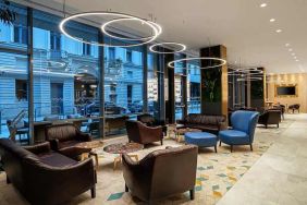 comfortable lobby and coworking space at Hilton Garden Inn Budapest City Centre.