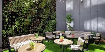 pretty outdoor terrace with seating area ideal for coworking at Hilton Garden Inn Budapest City Centre.