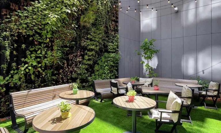 pretty outdoor terrace with seating area ideal for coworking at Hilton Garden Inn Budapest City Centre.