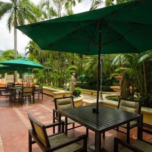 pretty outdoor terrace with seating area ideal for coworking at Hilton Princess San Pedro Sula.