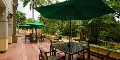 pretty outdoor terrace with seating area ideal for coworking at Hilton Princess San Pedro Sula.