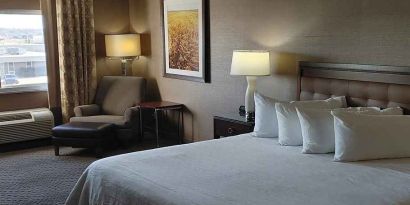 Comfortable delux king bedroom with couch at Wyndham Omaha.