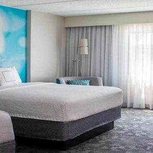 Comfortable queen room with business desk at Sonesta Select Atlanta Norcross I-85.