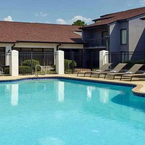 Stunning outdoor pool with sunbeds at Sonesta Select Atlanta Norcross I-85.