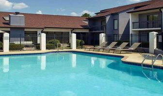 Stunning outdoor pool with sunbeds at Sonesta Select Atlanta Norcross I-85.