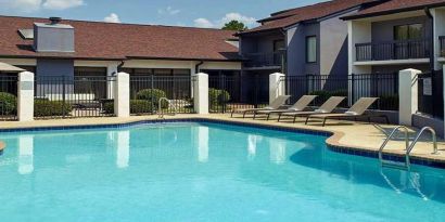 Stunning outdoor pool with sunbeds at Sonesta Select Atlanta Norcross I-85.