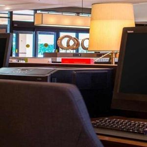 Dedicated business center and workspace with PC, internet, and printer at Sonesta Select Atlanta Norcross I-85.