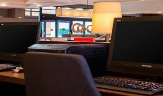 Dedicated business center and workspace with PC, internet, and printer at Sonesta Select Atlanta Norcross I-85.