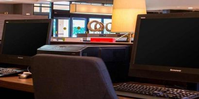 Dedicated business center and workspace with PC, internet, and printer at Sonesta Select Atlanta Norcross I-85.